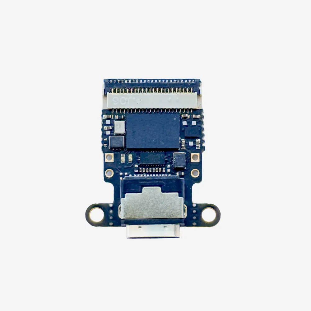 Photograph of a circuit board with an Neuropixels 1.0 port on one side and a USB C port on the opposite side.