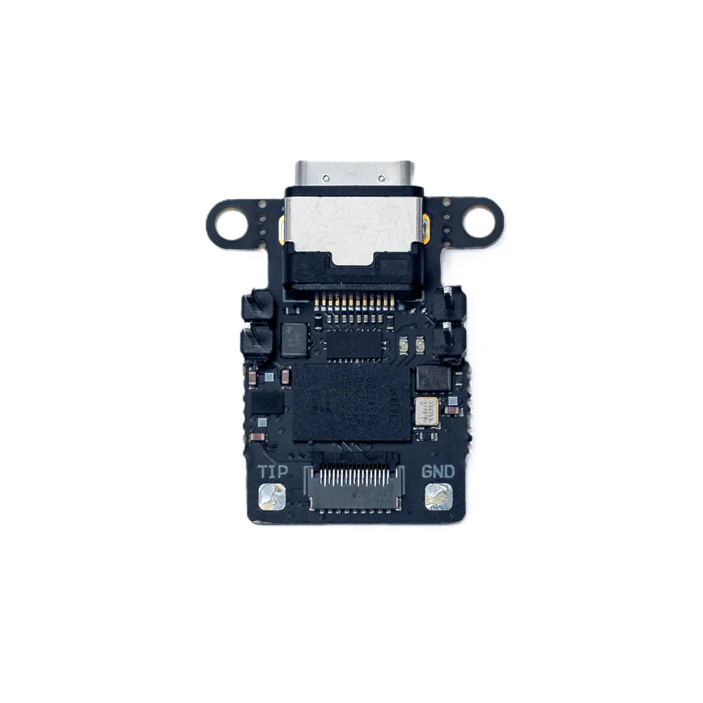 Photograph of a circuit board with a Neuropixels 2.0 port on one side and a USB C port on the opposite side.