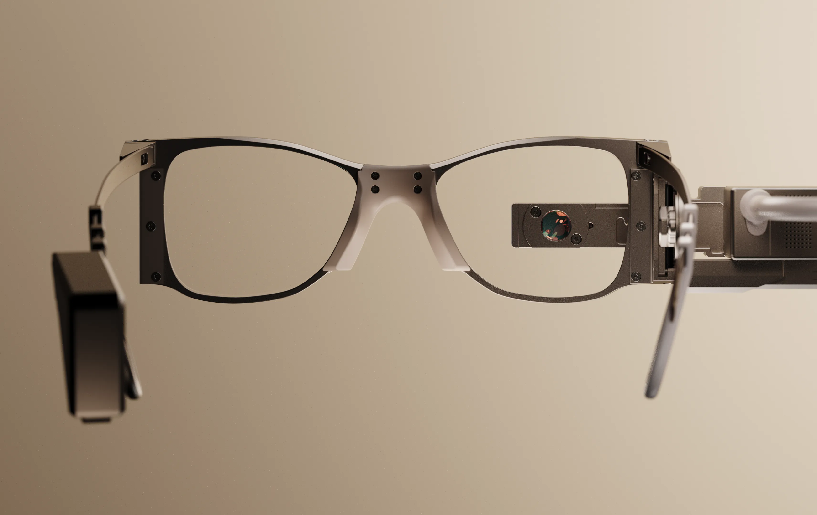 The PRIMA glasses shown with its infrared projector facing the viewer
