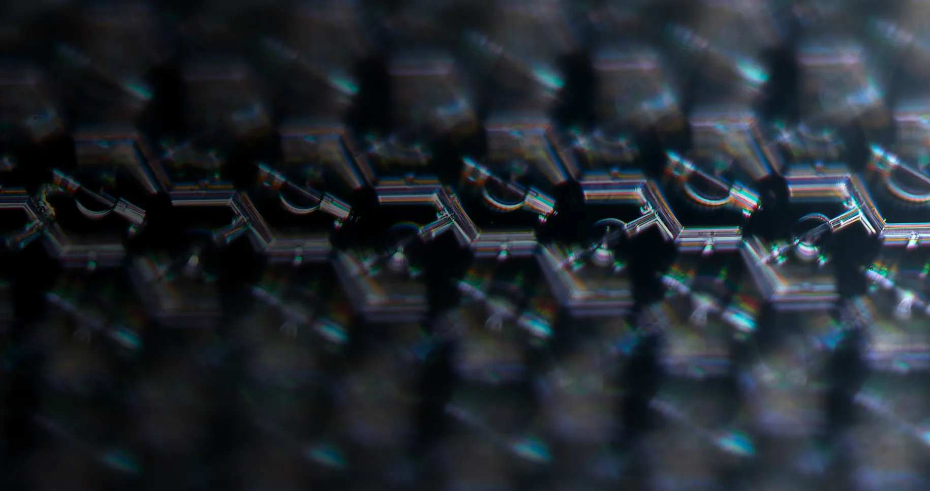 Extreme closeup image of the tiny, repeating hexagonal pattern of a PRIMA implant.