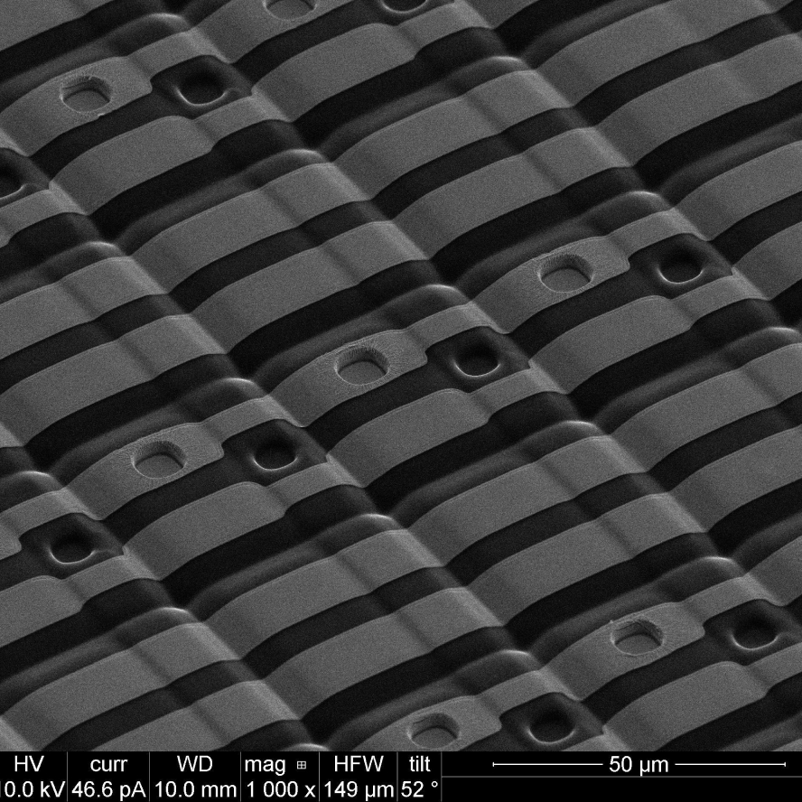 Photo showcasing a thin film electrode on a flexible neural array